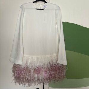 Elegant White Dress with Feathered Hem